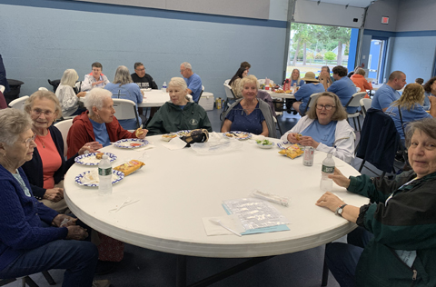 members enjoying picnic