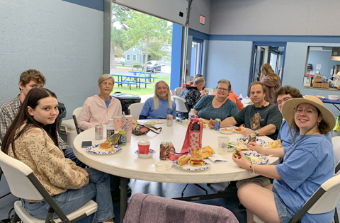 members enjoying lunch