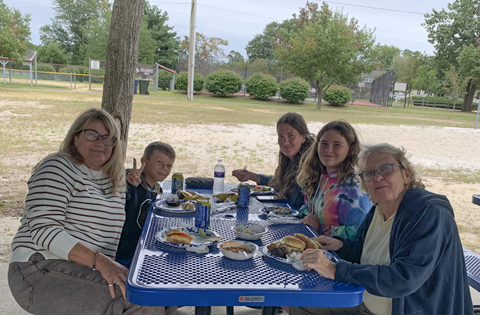 members at picnic table
